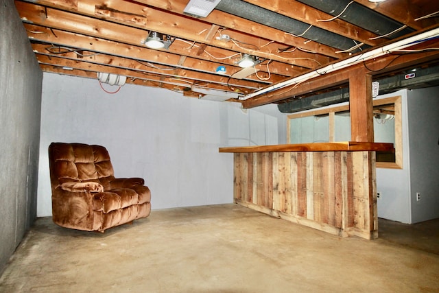 basement with a bar