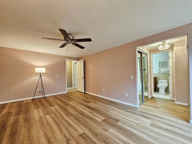 unfurnished bedroom with baseboards and light wood finished floors