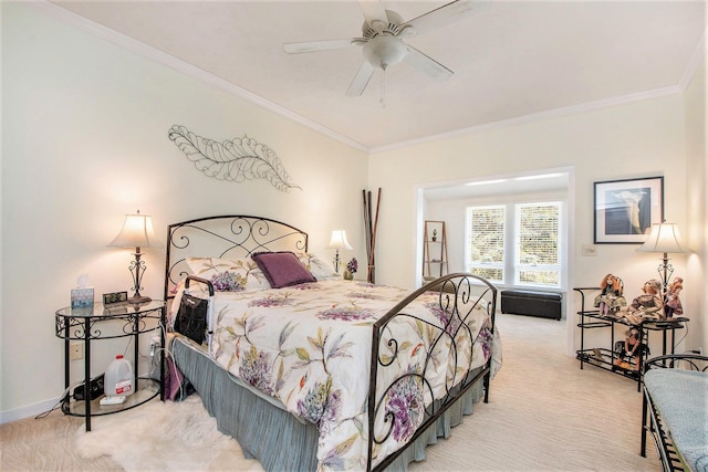 bedroom with crown molding, baseboards, and light carpet