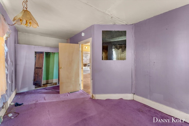 114 E St, Coopersville, MI 49404 - spare room featuring carpet