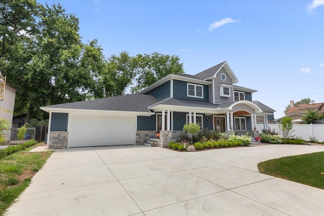 114 Bernstadt St, Novi, MI 48377 - view of front of property with a porch, a garage, fence, concrete driveway, and stone siding