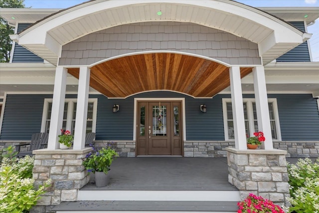 114 Bernstadt St, Novi, MI 48377 - entrance to property featuring covered porch and stone siding