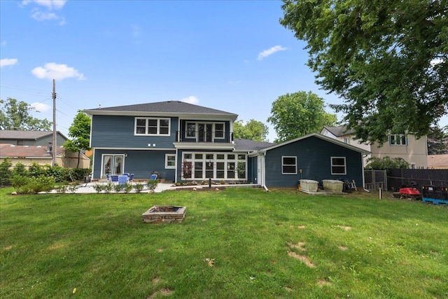114 Bernstadt St, Novi, MI 48377 - back of house with a yard, a patio, fence, and a fire pit