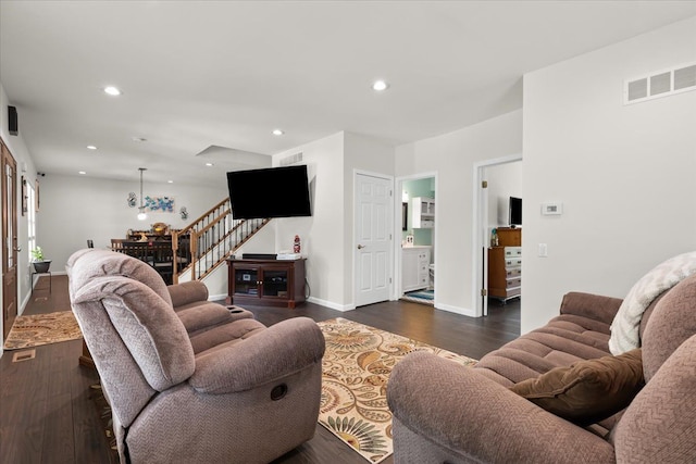 114 Bernstadt St, Novi, MI 48377 - living room with visible vents, stairs, baseboards, dark wood-style floors, and recessed lighting