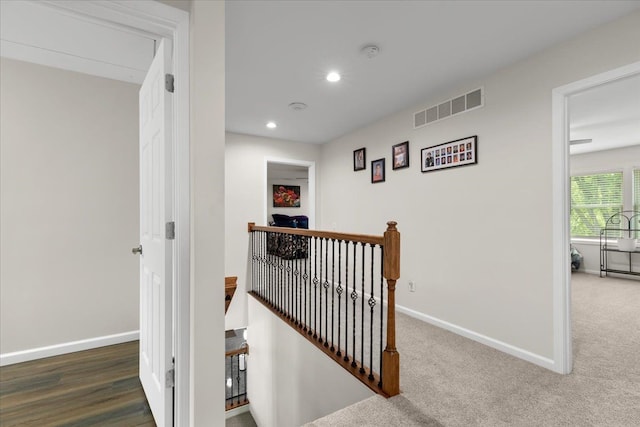 114 Bernstadt St, Novi, MI 48377 - hallway featuring baseboards, an upstairs landing, recessed lighting, and visible vents