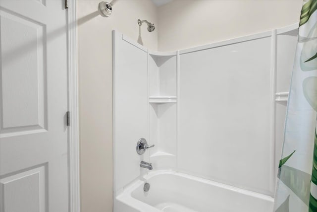 114 Bernstadt St, Novi, MI 48377 - bathroom featuring shower / tub combo with curtain