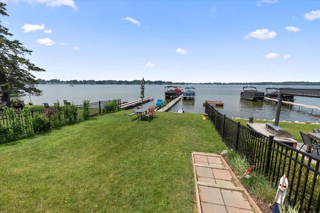 114 Bernstadt St, Novi, MI 48377 - dock area featuring a yard, a water view, and fence