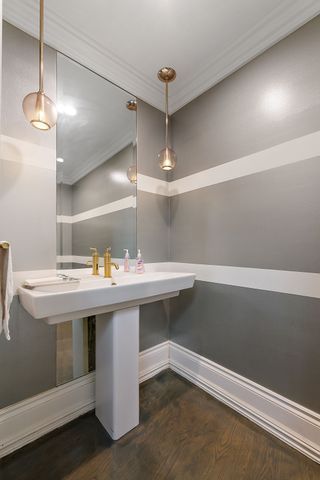 362 Keswick Rd, Bloomfield Hills, MI 48304 - bathroom featuring baseboards, ornamental molding, and wood finished floors