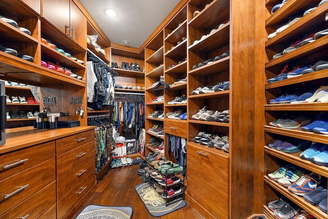 362 Keswick Rd, Bloomfield Hills, MI 48304 - spacious closet with dark wood-style flooring