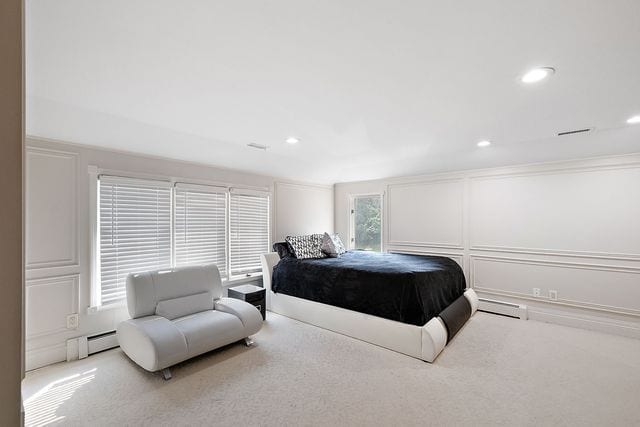 362 Keswick Rd, Bloomfield Hills, MI 48304 - carpeted bedroom featuring baseboard heating, a baseboard heating unit, and recessed lighting