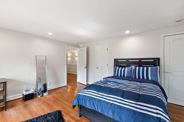 362 Keswick Rd, Bloomfield Hills, MI 48304 - bedroom with baseboards, recessed lighting, and wood finished floors