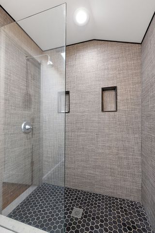 362 Keswick Rd, Bloomfield Hills, MI 48304 - full bathroom featuring vaulted ceiling and a shower stall
