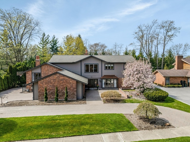 traditional home featuring a chimney