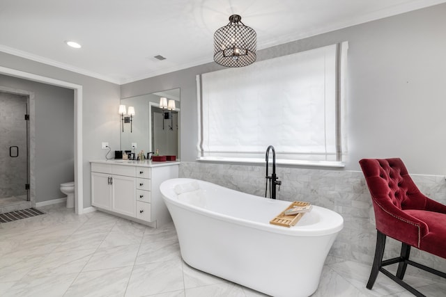 bathroom featuring vanity, toilet, visible vents, a soaking tub, and a stall shower