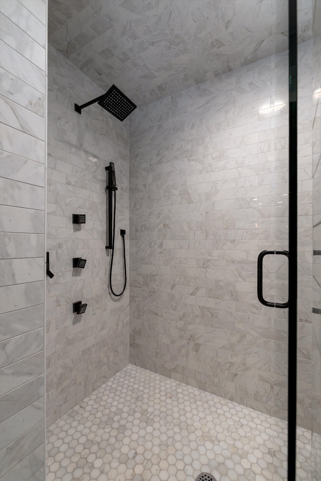 full bathroom featuring a shower stall
