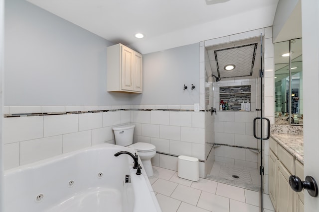 full bath featuring toilet, a tub with jets, tile walls, and a shower stall