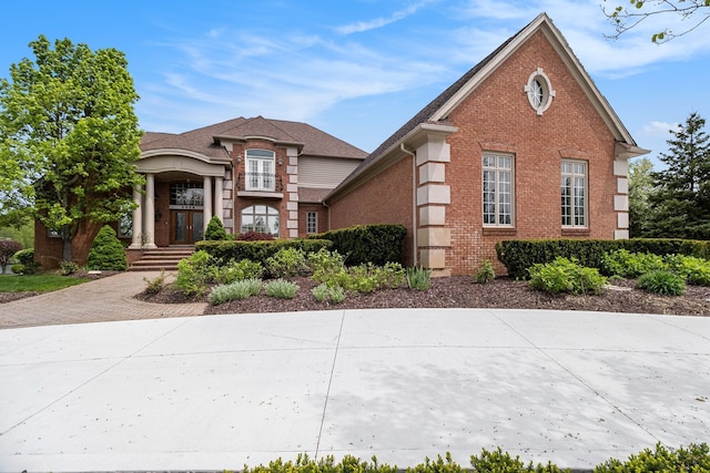 2832 Croftshire Ct, Rochester, MI 48306 - view of front facade featuring brick siding