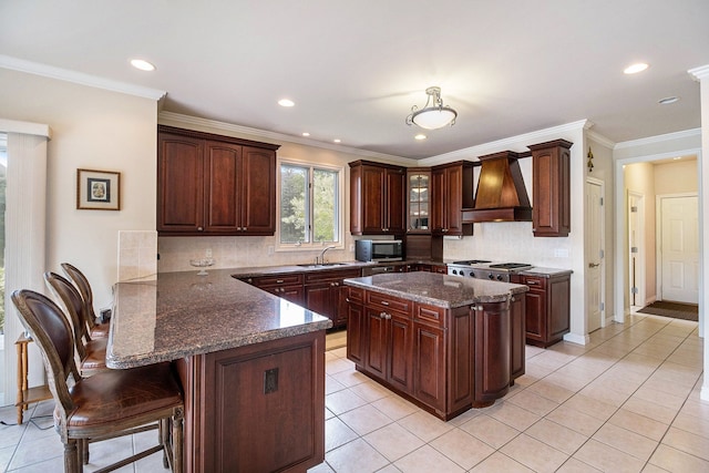 2832 Croftshire Ct, Rochester, MI 48306 - kitchen with a sink, dark stone counters, a peninsula, decorative backsplash, and custom exhaust hood