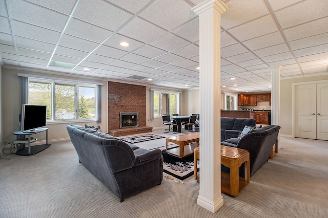 2832 Croftshire Ct, Rochester, MI 48306 - living area featuring light colored carpet, a fireplace, recessed lighting, baseboards, and ornate columns