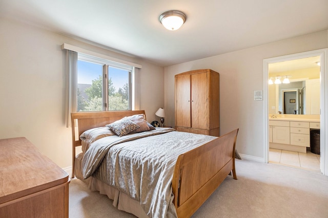 2832 Croftshire Ct, Rochester, MI 48306 - bedroom featuring baseboards, ensuite bathroom, and light colored carpet