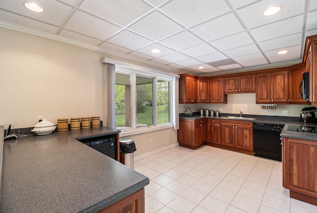 2832 Croftshire Ct, Rochester, MI 48306 - kitchen with dark countertops, brown cabinetry, a sink, and black appliances