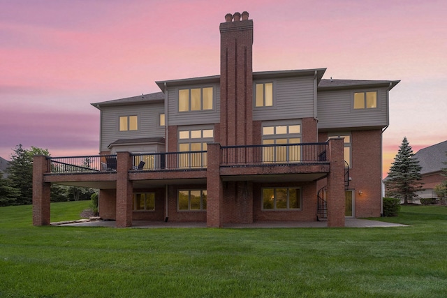 2832 Croftshire Ct, Rochester, MI 48306 - rear view of house featuring brick siding, a deck, a chimney, a patio, and a yard