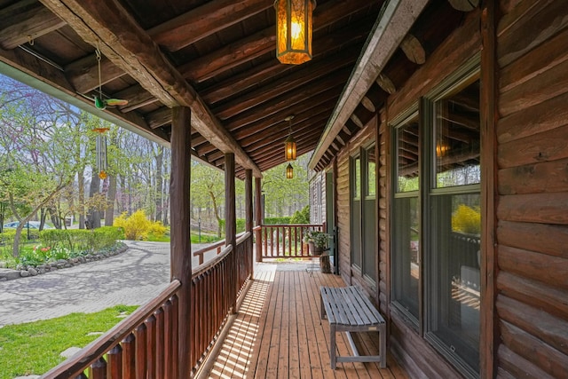 wooden terrace with a porch