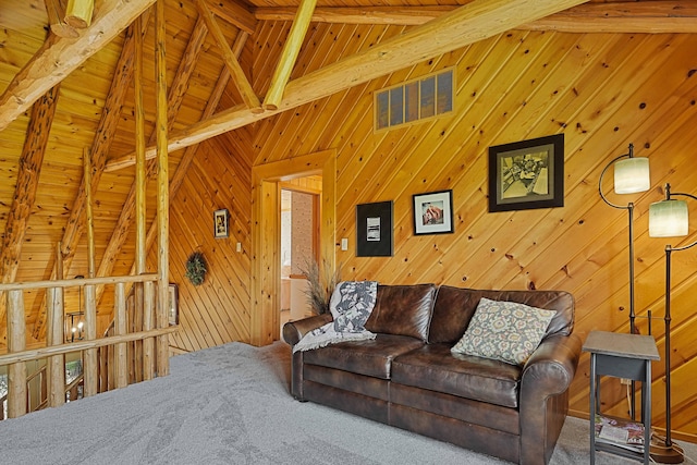 carpeted living area featuring wooden walls, wooden ceiling, and vaulted ceiling with beams