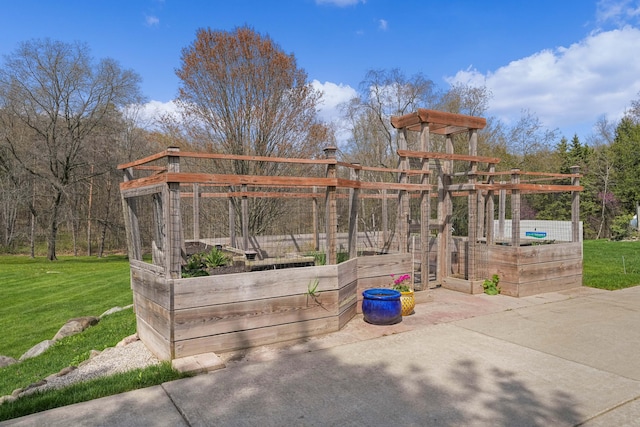 exterior space with a yard and a vegetable garden
