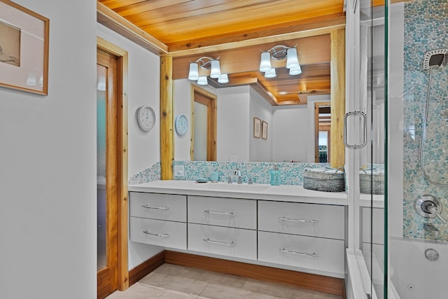 bathroom featuring tile patterned floors, a combined bath / shower with jetted tub, wooden ceiling, and vanity