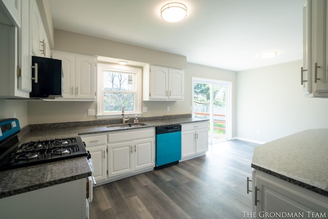 kitchen featuring white cabinets, dark wood-style flooring, a sink, dishwasher, and gas range oven
