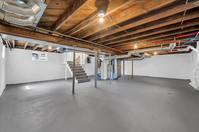 2061 E Whittemore Ave, Burton, MI 48529 - basement featuring stairs and water heater