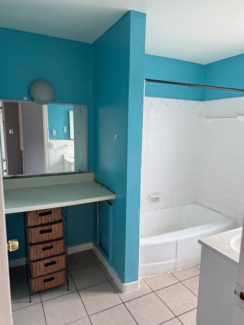full bathroom featuring tile patterned floors, vanity, and tub / shower combination