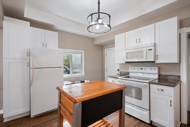 kitchen featuring wood counters, white cabinets, white appliances, and dark wood-style floors