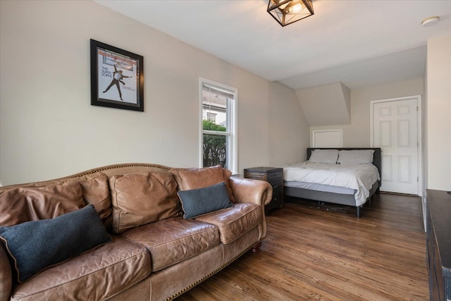 bedroom featuring wood finished floors