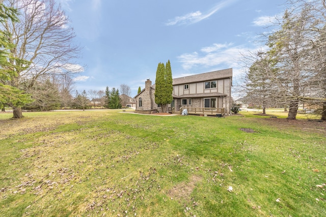 view of yard featuring a wooden deck
