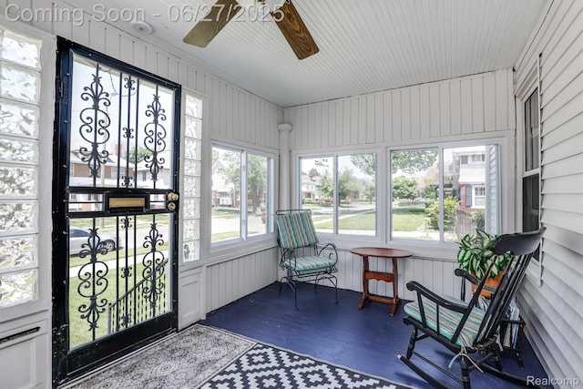 879 Lawrence St, Detroit, MI 48202 - sunroom featuring a ceiling fan and healthy amount of natural light