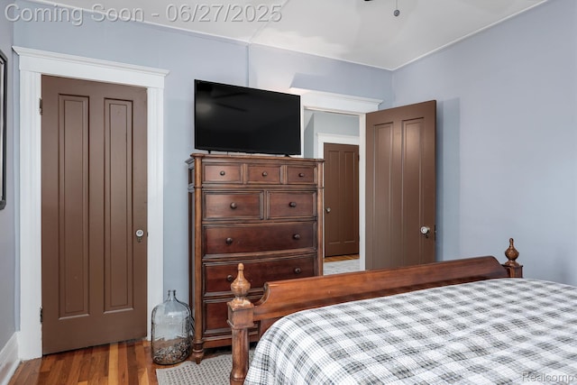 879 Lawrence St, Detroit, MI 48202 - bedroom featuring wood finished floors