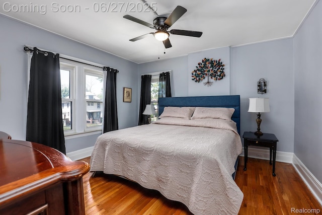 879 Lawrence St, Detroit, MI 48202 - bedroom with wood finished floors and ceiling fan