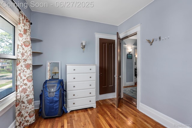 879 Lawrence St, Detroit, MI 48202 - bedroom with wood finished floors