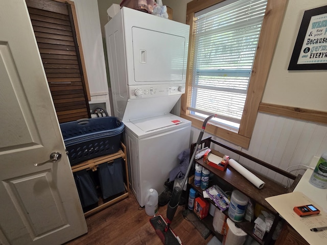 4280 Birch St, Lake, MI 48632 - clothes washing area with stacked washer / drying machine, wood finished floors, and wainscoting