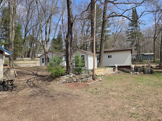 4280 Birch St, Lake, MI 48632 - view of yard with an outdoor structure and view of scattered trees