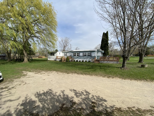 view of yard featuring a deck
