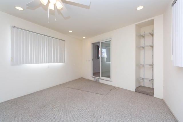 empty room featuring carpet flooring, recessed lighting, and ceiling fan