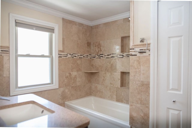 full bathroom featuring ornamental molding, shower / washtub combination, and a sink