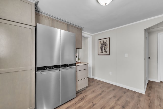 2040 Freeman St, Westland, MI 48186 - kitchen with baseboards, freestanding refrigerator, light wood-style flooring, and ornamental molding