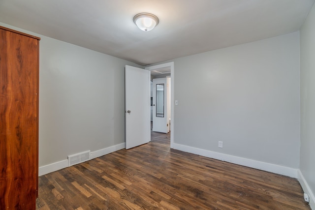 2040 Freeman St, Westland, MI 48186 - interior space with baseboards, dark wood-style floors, and visible vents