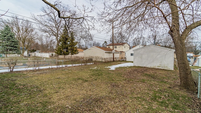 2040 Freeman St, Westland, MI 48186 - view of yard with fence, an outbuilding, and a residential view