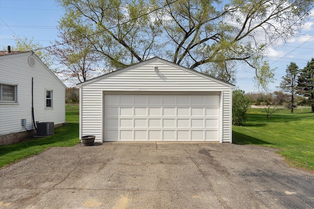 detached garage featuring central air condition unit