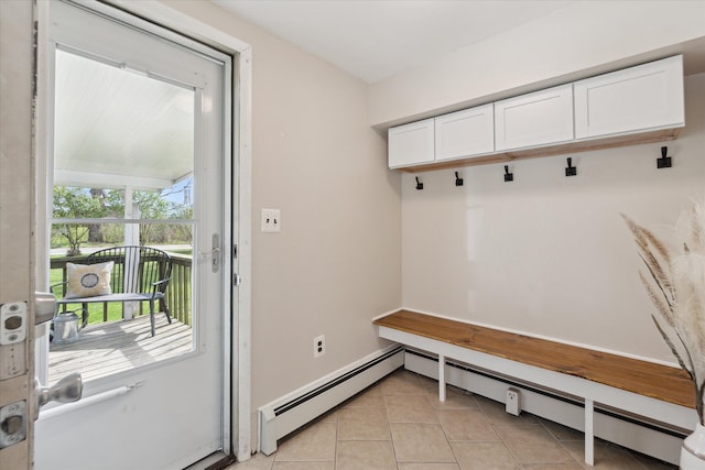 mudroom featuring baseboard heating and light tile patterned floors